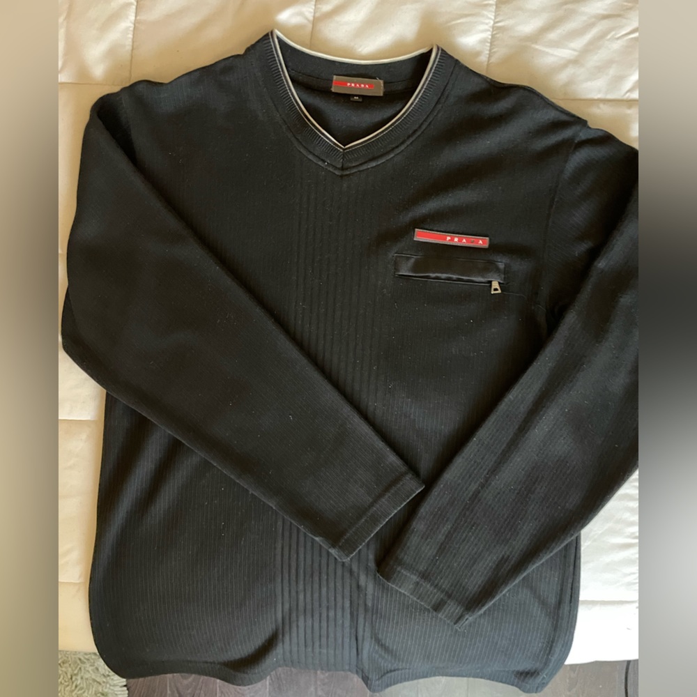 Stunning black color light weight sweater by Prada